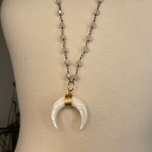 Gold and White Beaded Necklace with Horn Charm